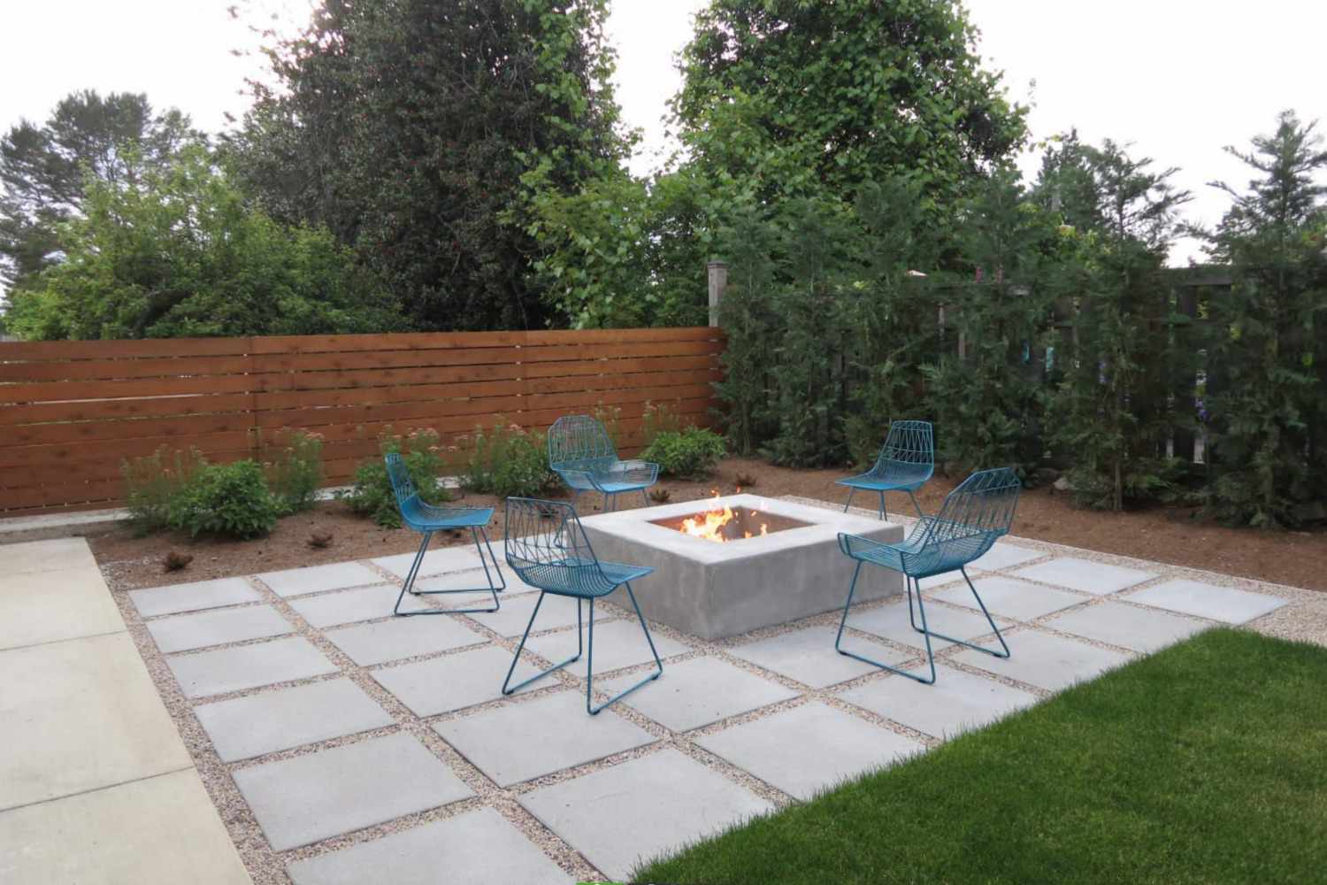 Paver patio and fire pit hardscaping project by Lanney Property Care in Worcester County, MA